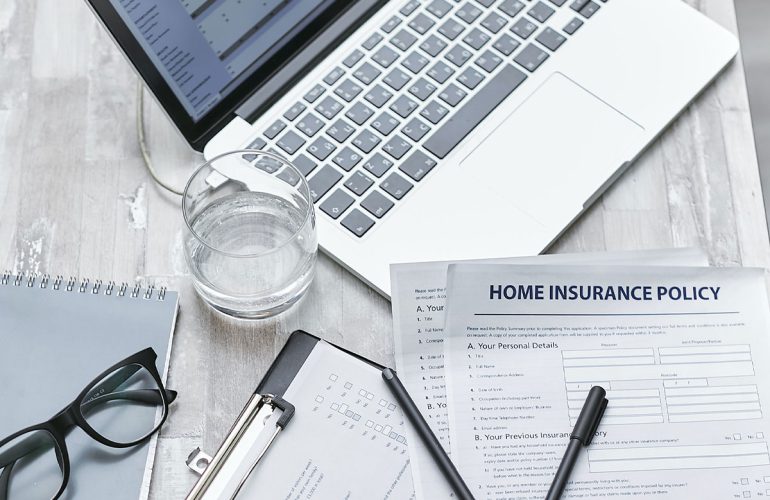insurance forms on a table